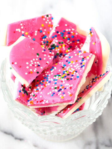 A glass bowl filled with Frosted Circus Bark.